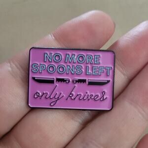 "No more spoons left, only knives" funny lapel pin